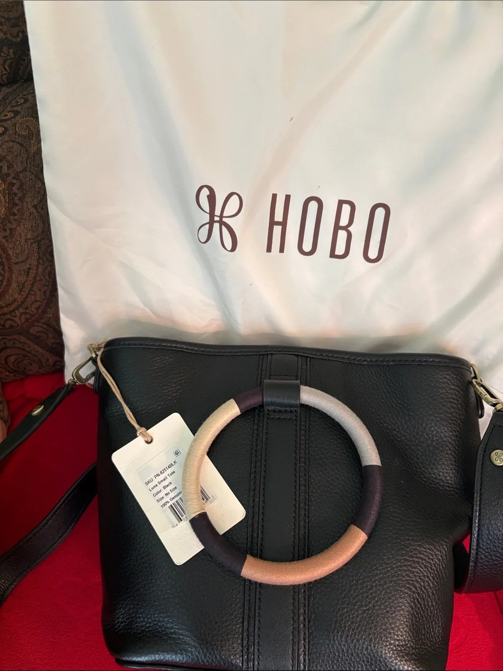 HOBO Black Pebbled Leather Hobo with Multicolor Ring Accent